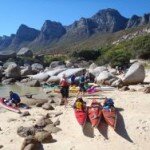 Kayaks at Oudekraal beach Cape Town by silke carstensen